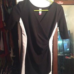 a slim black and white formal dress